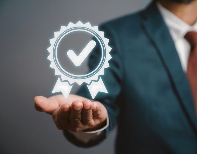 vecteezy_businessman-holding-quality-assurance-and-iso-certification_57838294 vecteezy_businessman-holding-quality-assurance-and-iso-certification_57838294