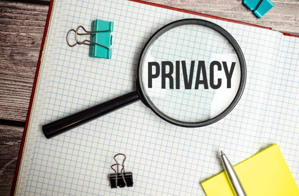 magnifying glass with the text PRIVACY. Business concept magnifying glass with the text PRIVACY. Business concept